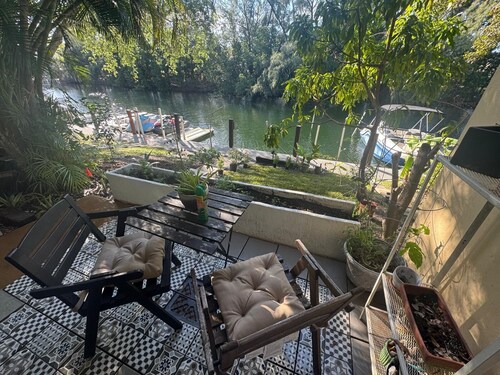 Waterfront Condo with Fishing, Paddleboard, and yard access.