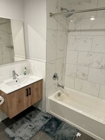 Hair dryer, towels, soap, shampoo