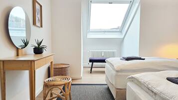 1 bedroom, desk, iron/ironing board, travel crib