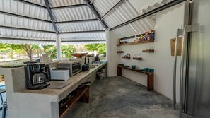 Fridge, stovetop, cookware/dishes/utensils