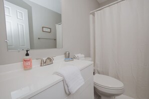 Hair dryer, towels, soap, toilet paper