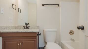 Hair dryer, towels, soap, toilet paper