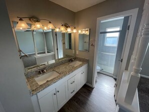 Shower, hair dryer, towels, toilet paper