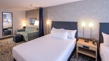 Desk, laptop workspace, blackout drapes, iron/ironing board