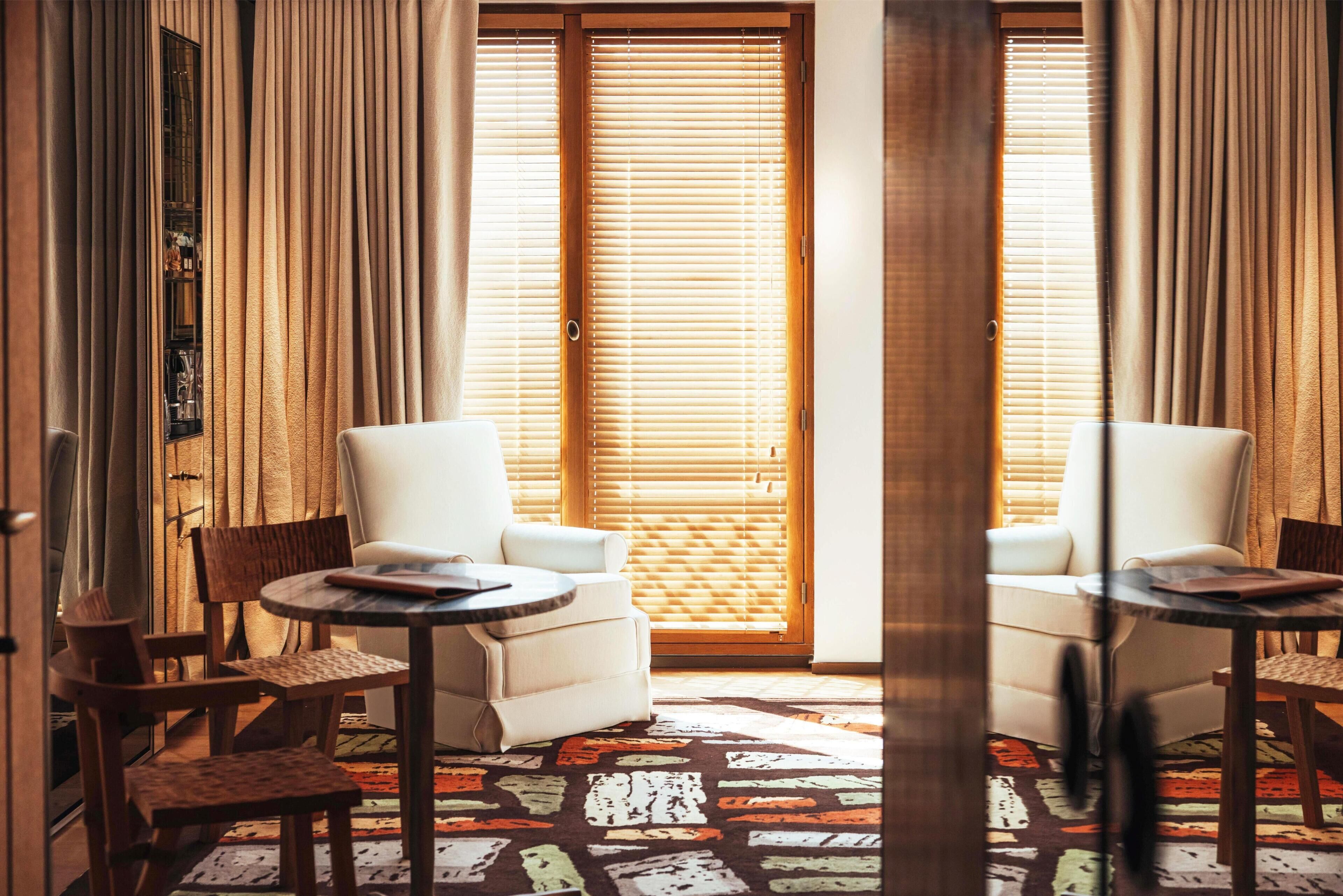 Room, 1 King Bed | Living area | 55-inch flat-screen TV with satellite channels, heated floors