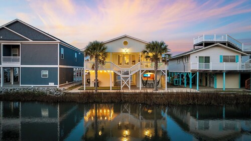 The Cherry On Top! Amazing 4-bedroom channel home with Arcade and Putting Green!