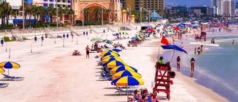 On the beach, sun-loungers, beach towels