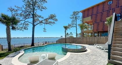 ULTIMATE LUXURY ON THE WATER! HEATED POOL AND HOT TUB!