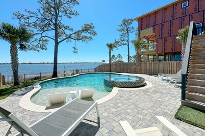 ULTIMATE LUXURY ON THE WATER! HEATED POOL AND HOT TUB!