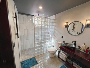 Shower, hair dryer, towels, soap