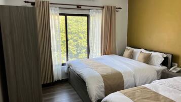 Double or Twin Room, Lake View | Laptop workspace, free WiFi, bed sheets