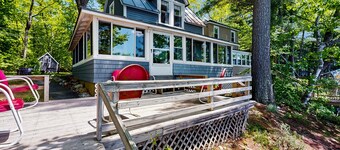 Lakefront dog friendly cottage w/ a dock & beautiful sunset views