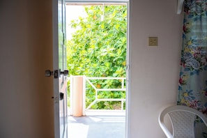 Economy Suite, Balcony, Garden View | Terrace/patio
