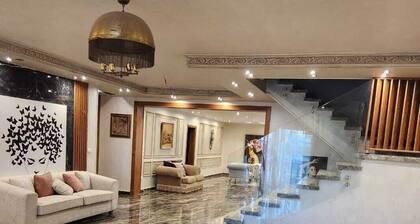 Luxurious 13-bedroom villa in phenomenal location in El Sheikh Zayed City.