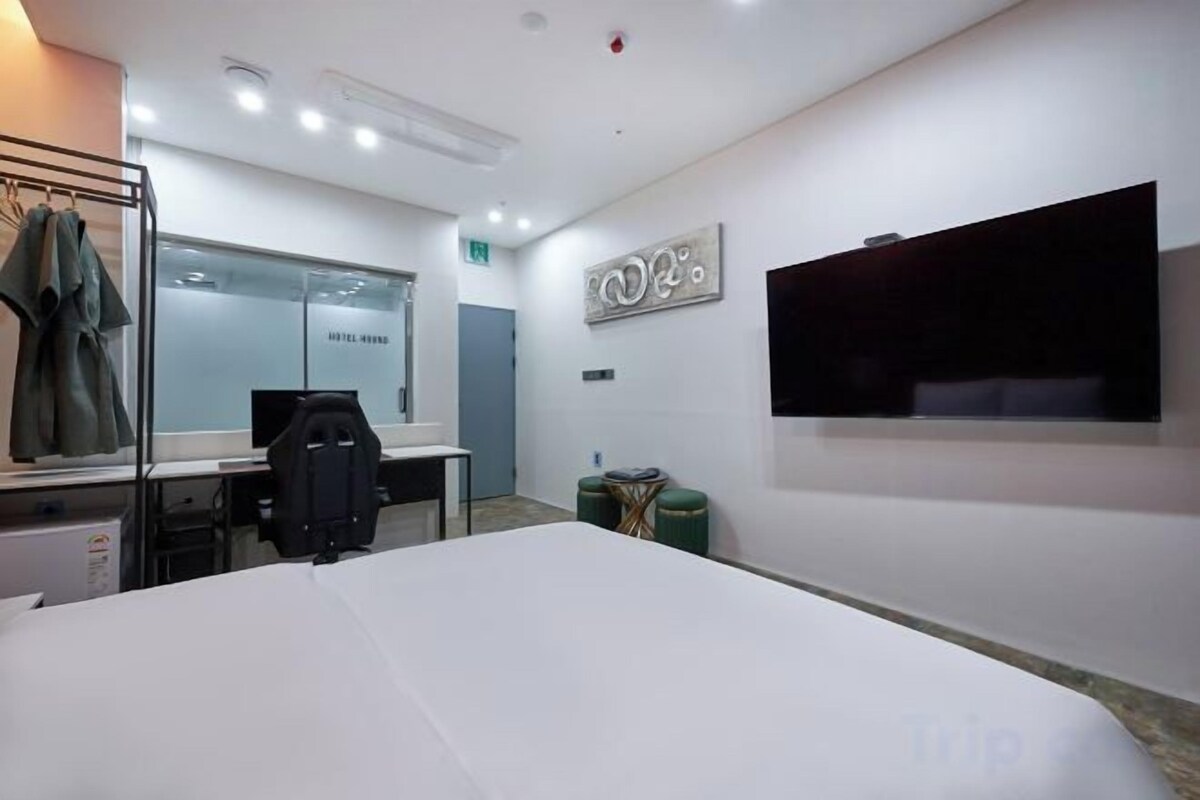 Desk, laptop workspace, blackout curtains, free WiFi