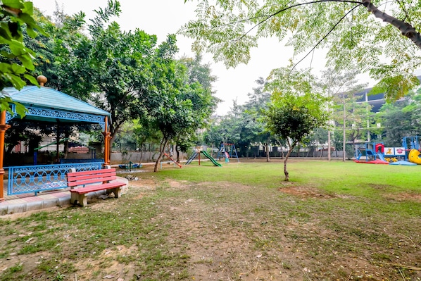 Elite Apartment, Ground Floor | Garden view