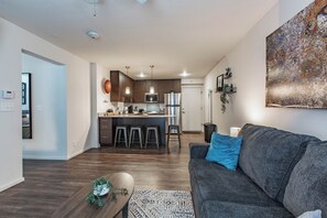 Living area - Lion's Den 1 BR 1 BD Dedicated Worspace in the bedroom FREE carport WiFi Clean (Overland Park)