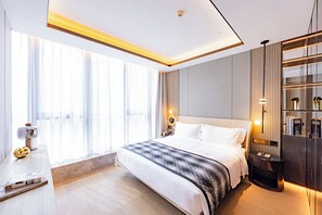 Dundyner, minibar (inkludert), safe på rommet og blendingsgardiner