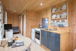 Fridge, oven, cookware/dishes/utensils