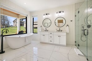 Shower, hair dryer, towels, shampoo