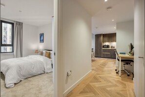 2 bedrooms, desk, iron/ironing board, travel crib