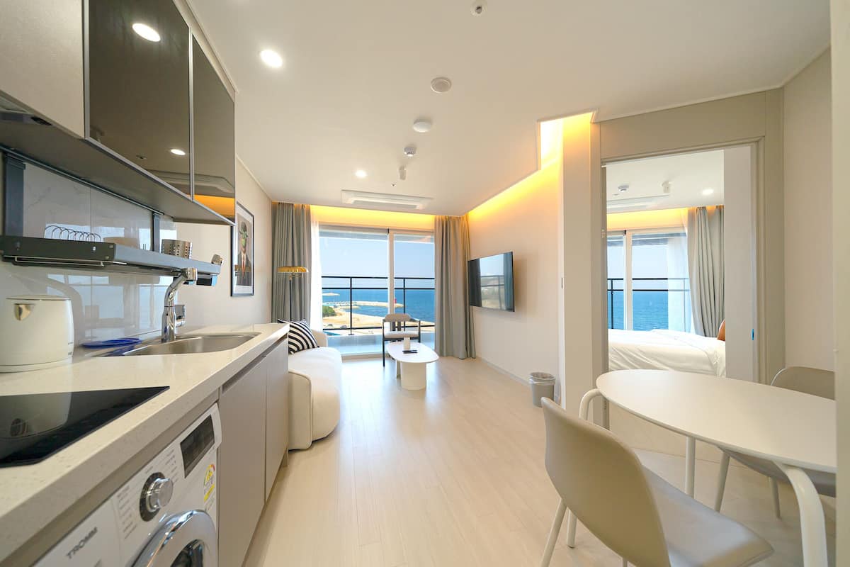 Premier Suite B | Living room | 55-inch Smart TV with cable channels, Netflix, pay movies