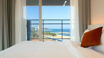 Premier Suite A | Premium bedding, desk, laptop workspace, blackout drapes