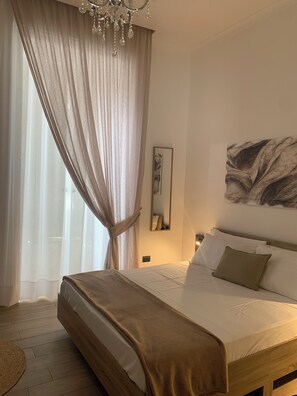 3 slaapkamers, een strijkplank/strijkijzer, gratis wifi, beddengoed