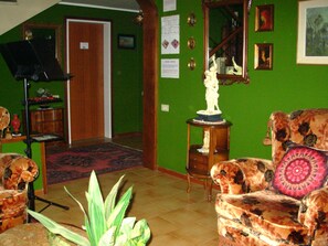 Shared Dormitory, 1 Bedroom, Smoking, Balcony | Living room | Books