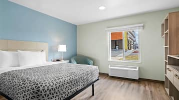 Suite, 1 Queen Bed, Non Smoking | Desk, laptop workspace, blackout drapes, iron/ironing board