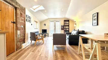 TV connectée, lecteur de DVD, livres, vidéothÚque