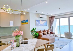 Superior Apartment, 3 Bedrooms, Beach View | Living area | 55-inch Smart TV with digital channels, Netflix, table tennis - The Song Condotel VungTau-Hao's Homestay (Ho Chi Minh City)