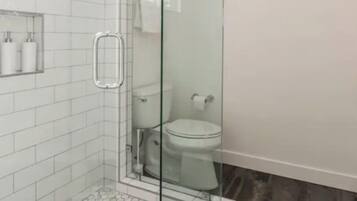 Superior Apartment | Bathroom | Hair dryer, towels, soap, shampoo