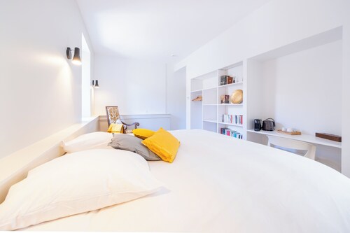 Bucolic room in a medieval tower with shared space on the ground floor