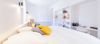 Bucolic room in a medieval tower with shared space on the ground floor