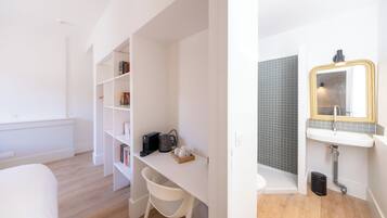 1 bedroom, desk, iron/ironing board, travel crib