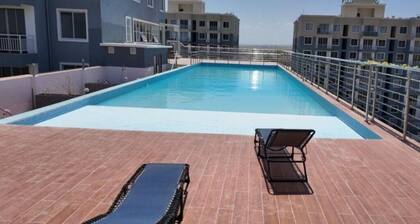 Cozy studio with wheelchair access, pool, free parking, and 24/7 security.