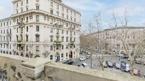 A multi-story building with classical architecture, featuring balconies and large windows. - Easylife - Classy apartment in Buenos Aires (Milano)