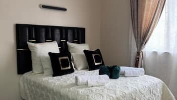 2 habitaciones, tabla de planchar con plancha, wifi y ropa de cama