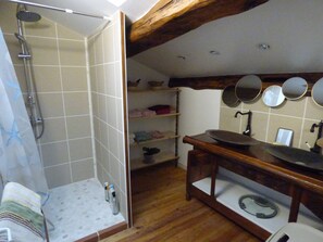 Shower, hair dryer, towels, toilet paper