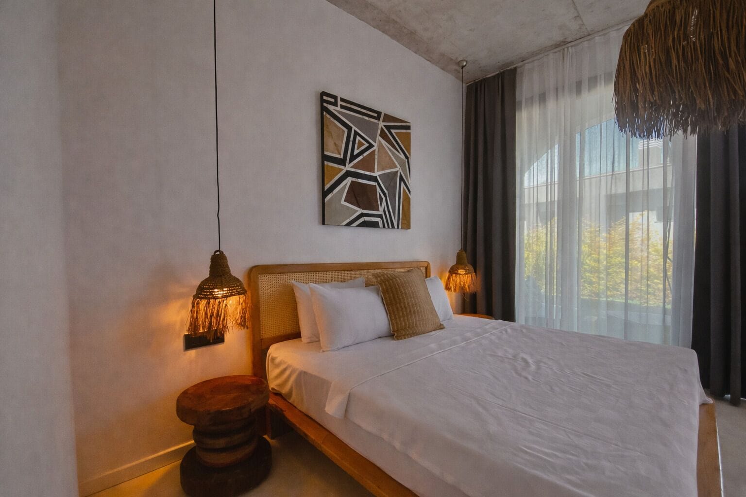 Deluxe Suite With Garden View | Minibar, in-room safe, individually decorated, soundproofing