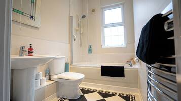 Hair dryer, towels, soap, toilet paper