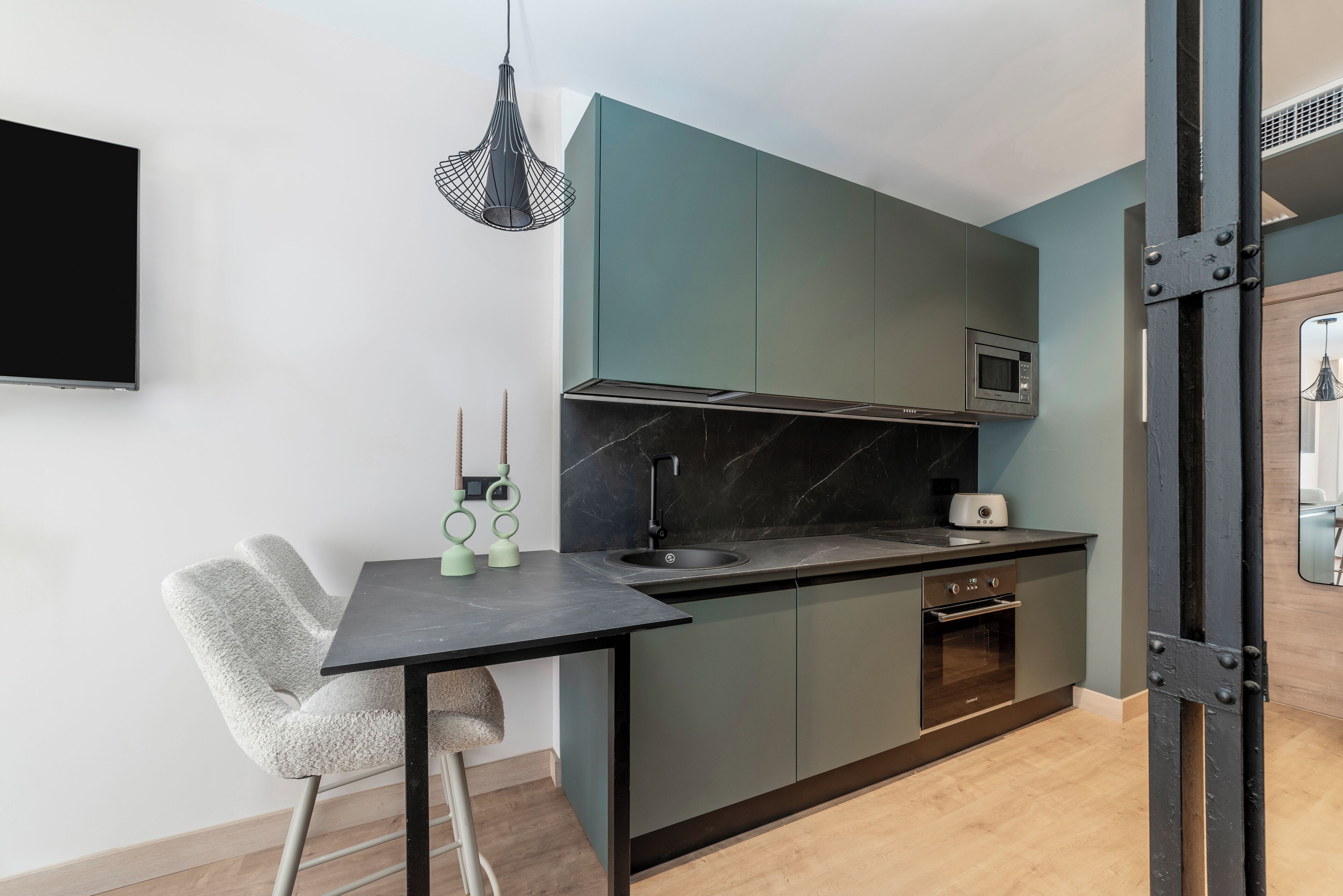 Design Apartment, Balcony, City View | Private kitchen | Mini-fridge, microwave, oven, stovetop