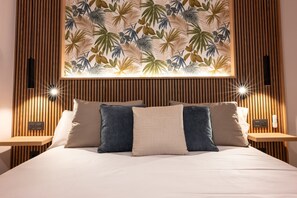 4 chambres, coffres-forts dans les chambres, fer et planche à repasser