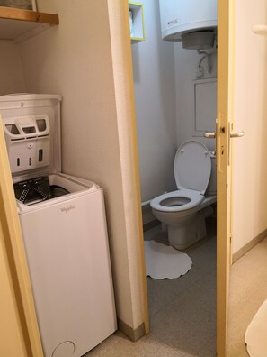 Hair dryer, towels, soap, toilet paper