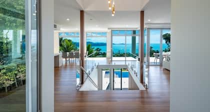 Luxurious 5-bed home with pool, nestled in a private estate with ocean views