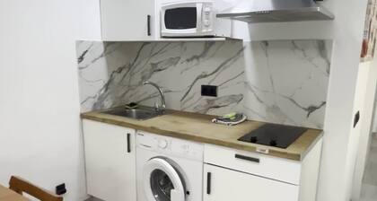 Second floor apartment in facility with direct beach access