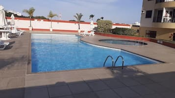 Outdoor pool, open 9:00 AM to 8:00 PM, pool umbrellas, sun loungers