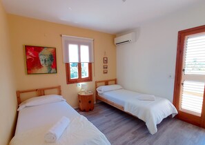 4 dormitorios, tabla de planchar con plancha, wifi y ropa de cama