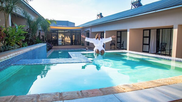 Outdoor pool, sun loungers - The Telescope Boutique Lodge (Victoria Falls)